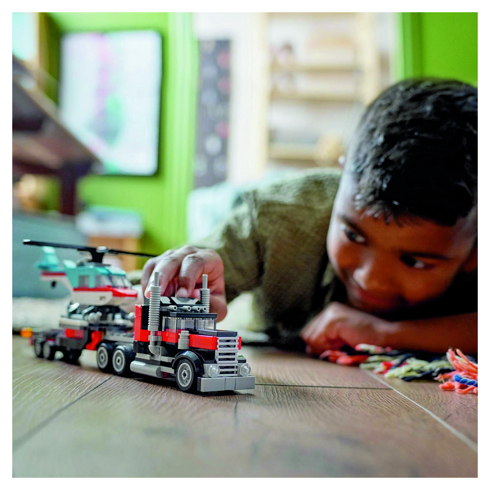 LEGO Bauspielzeug  Tieflader mit Hubschrauber Creator Spielwaren